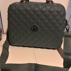 it Luggage Glitzy hardside vanity case in an olive green color